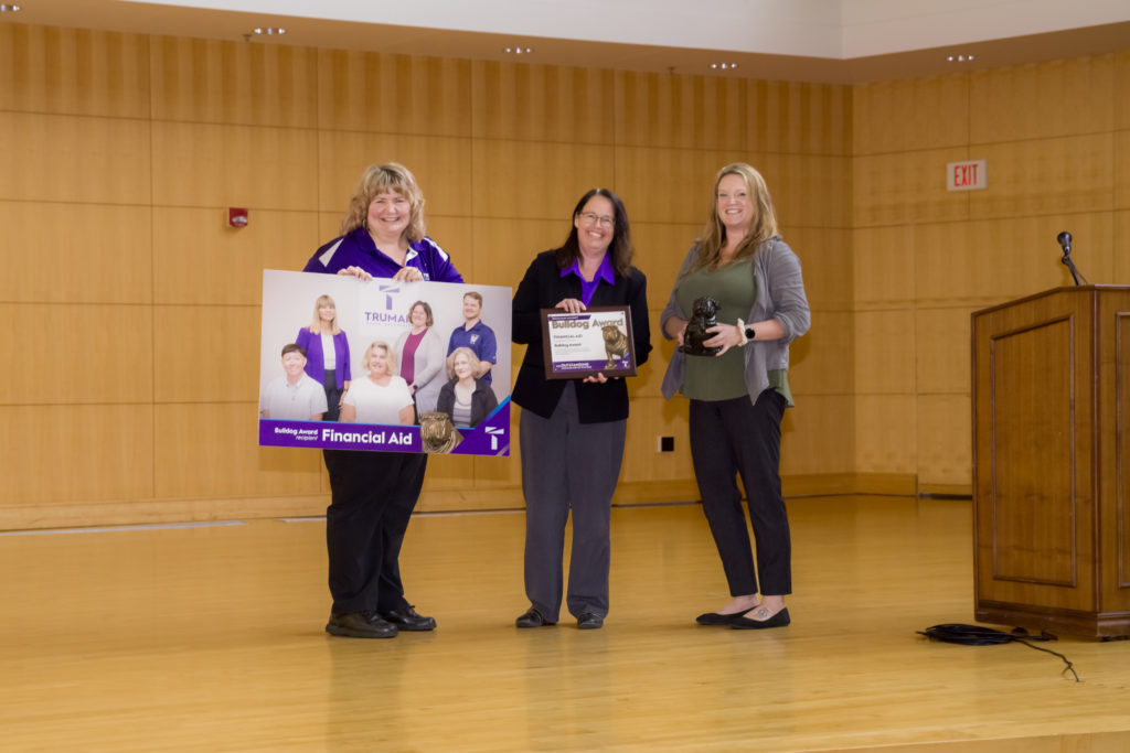 Financial Aid Team accepting award