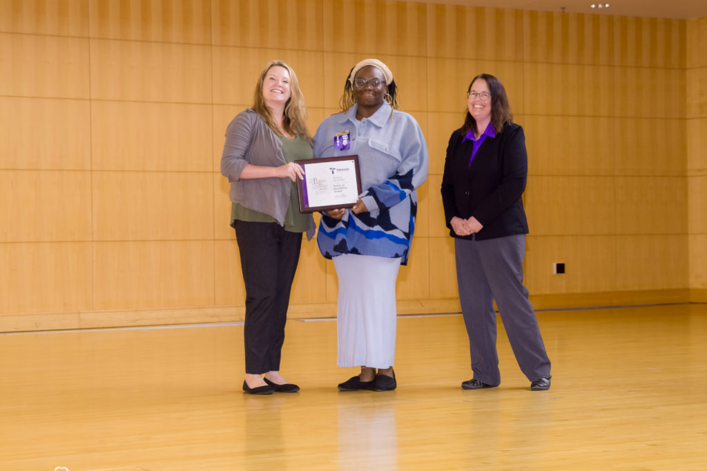 Vanessa Alexander accepts the Points of Excellence Award.