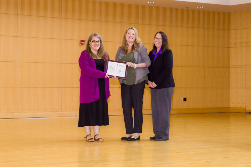 Katie Best accepts the Points of Excellence Award.