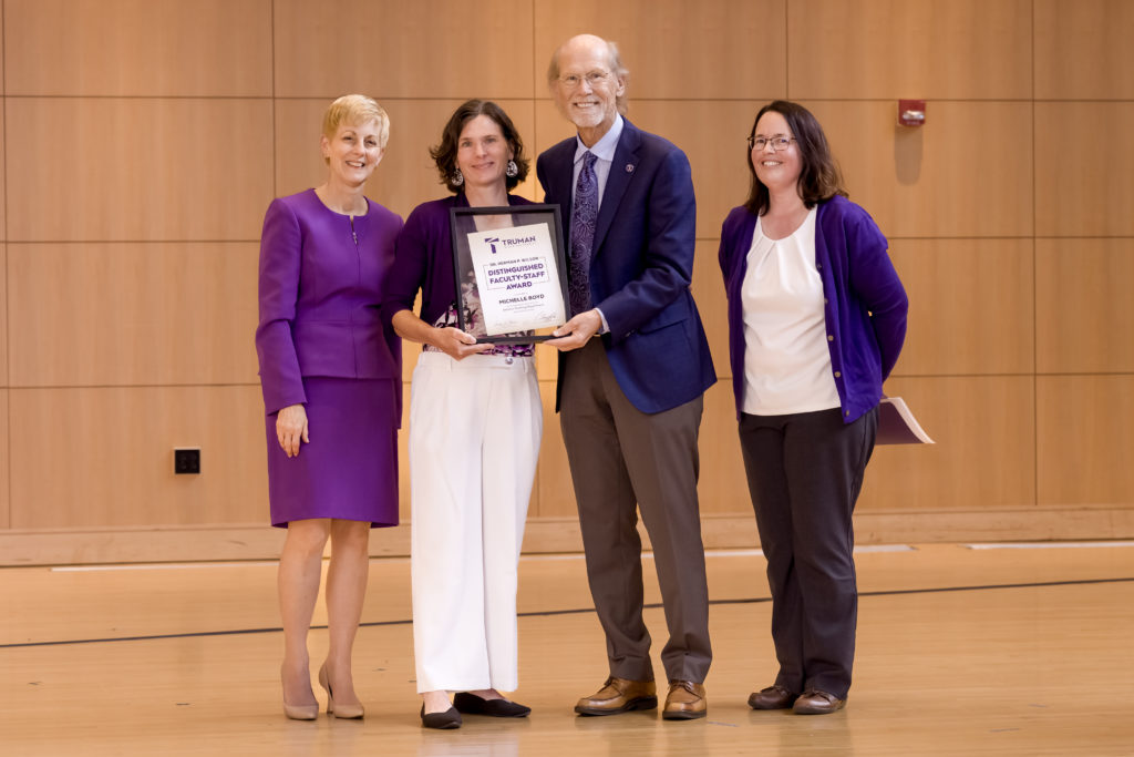 Michelle Boyd receiving her award